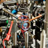 This device measures acceleration and rotation by shining lasers into small clouds of rubidium atoms.