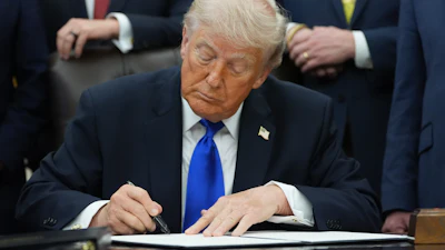 President Donald Trump signs a presidential permit regarding pipeline construction in the Oval Office of the White House, Thursday, April 30, 2026, in Washington.