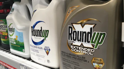 Containers of Roundup are displayed on a store shelf in San Francisco, Feb. 24, 2019.