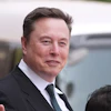 Elon Musk departs after a welcome ceremony with President Donald Trump and China's President Xi Jinping at the Great Hall of the People, Thursday, May 14, 2026, in Beijing.
