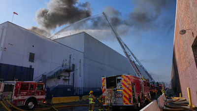Crews work a warehouse fire in the Boyle Heights section of Los Angeles, June 17, 2026.