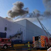 Crews work a warehouse fire in the Boyle Heights section of Los Angeles, June 17, 2026.