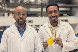 Professor Tizazu Mekonnen (left) and PhD student Aklilu G. Messele holding the flexible polymer material developed to replace the lead in heavy X-ray aprons.