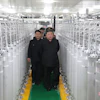 In this photo provided by the North Korean government, its leader Kim Jong Un, front right, visits a new facility to produce nuclear bomb fuels at an undisclosed place in North Korea Wednesday, June 3, 2026. Independent journalists were not given access to cover the event depicted in this image distributed by the North Korean government. The content of this image is as provided and cannot be independently verified. Korean language watermark on image as provided by source reads: 'KCNA' which is the abbreviation for Korean Central News Agency.