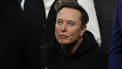 Elon Musk attends the finals for the NCAA wrestling championship, March 22, 2025, in Philadelphia.