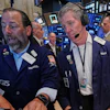 Specialist Michael Pistillo, left, and trader Sean Spain work on the floor of the New York Stock Exchange, Tuesday, June 16, 2026.