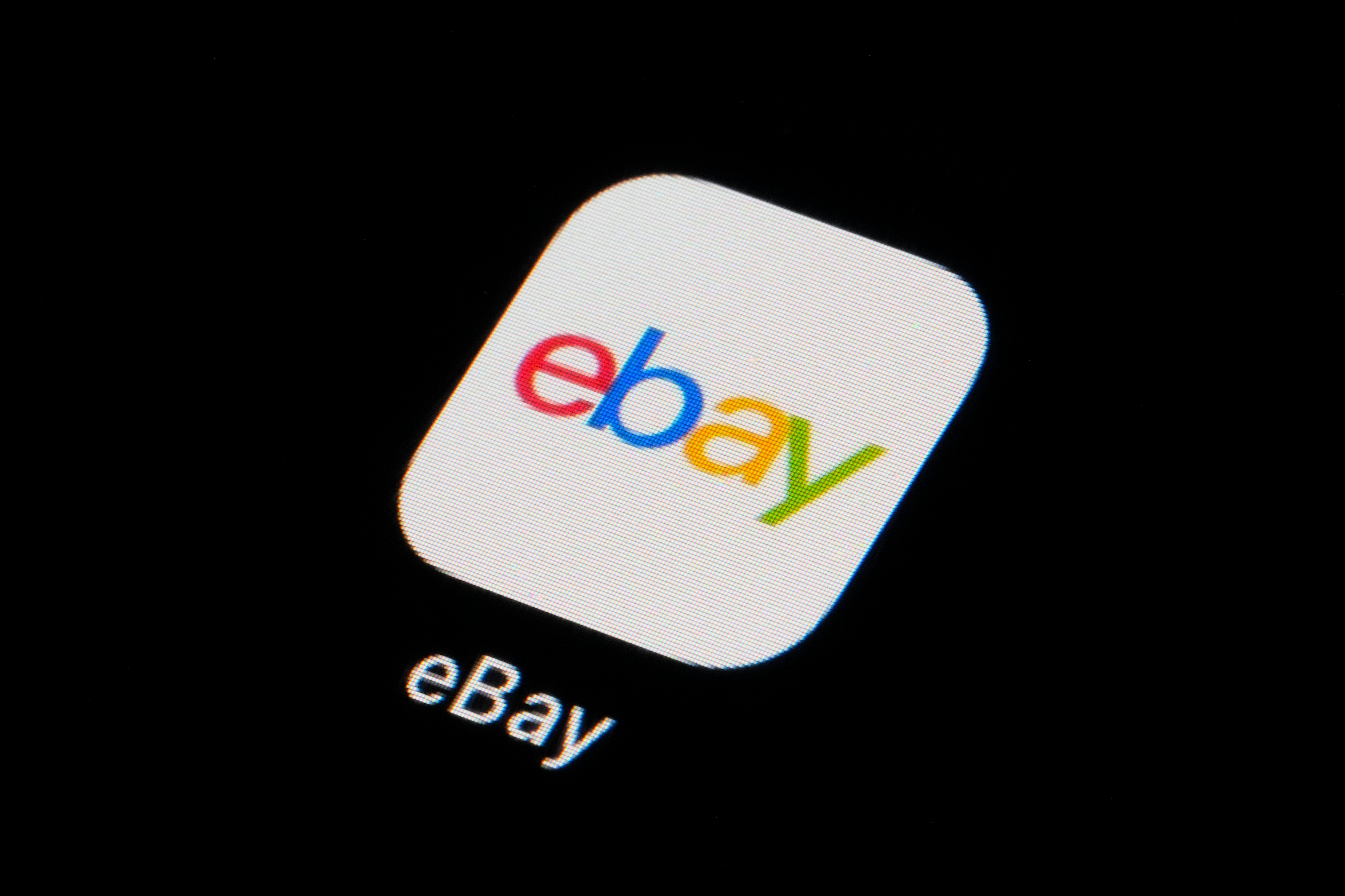 The eBay app icon is seen on a smartphone, Feb. 28, 2023, in Marple Township, Pa.