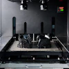 A vat photopolymerization process fabricates a component by curing liquid resin layer by layer using light.