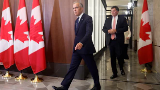 Prime Minister Mark Carney and Canada-U.S. Trade Minister Dominic LeBlanc arrive at a news conference on Parliament Hill, Ottawa, Aug. 22, 2026.