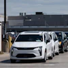 Chrysler Pacificas are driven off the lot at Windsor Assembly Plant in Windsor, Ontario, Canada, on Monday, Aug. 24, 2026.