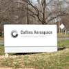 Collins Aerospace corporate sign on landscaped grounds with bare trees and road