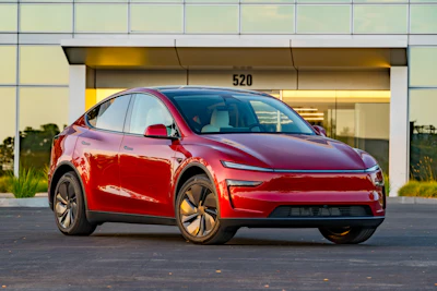 This photo provided by Edmunds shows the Tesla Model Y. This electric SUV offers a spacious interior, plenty of range, and advanced driving features that make long trips less tedious.