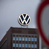 A view of a pedestrian traffic sign near to the Volkswagen brand skyscraper, in Wolfsburg, Germany, Friday, Sept. 4, 2026.