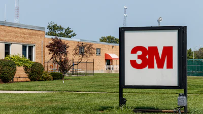 3M company logo on outdoor sign in front of brick facility building