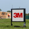 3M company logo on outdoor sign in front of brick facility building