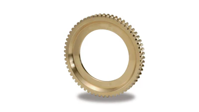 Brass gear ring with external teeth on white background