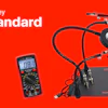 DigiKey Standard electronic testing equipment including digital multimeter and circuit board analyzer on red background