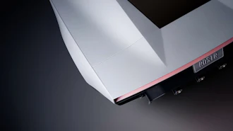 CORSAIR gaming device with white and red design on dark background